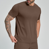 T-shirt pour homme, coupe ajustée, extensible dans 4 directions, séchage rapide, col rond, respirant, évacuation de l'humidité, idéal pour la gym, la course à pied et les sports
