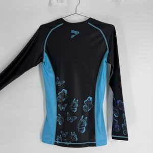 Camiseta de Compresión para Mujer Elite, Diseñada para Máxima Comodidad y Protección en Condiciones Extremas - Product Image 6