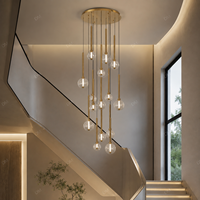 Lustre moderne de luxe pour villa, escalier, hall d'hôtel, entrée de duplex, hall d'accueil, éclat chaleureux, design élégant, suspension multiple, intérieur