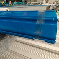 Porte à enroulement industrielle en acier résistante au vent et aux tempêtes, à lames perforées en acier robuste pour entrepôt extérieur