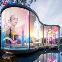 Écran LED transparent HD pour mur adhésif en verre de magasin Écran LED à film flexible transparent d'intérieur