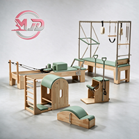 Ensemble de Pilates Premium MJD en Chêne Massif Cinq Pièces : Reformer, Cadillac, Table Trapèze, Chaise Wunda, Barrel, Correcteur de Colonne Vertébrale, pour Usage Privé