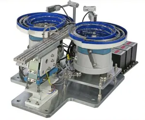 Vibration feeder bowl with pick and place assembly