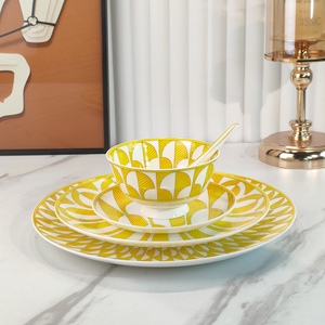 Juego de Vajilla de Porcelana China Ecológica con Estampado Geométrico Amarillo y Blanco, 4 Piezas con Tazones, Platos y Cuchara para Comer en Casa - Product Image 1