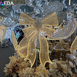 LEDA Semi Transparente Luz Oro Bowknot Decoración LED Road Lead Stand para pasillo Decoración de la boda - Product Image 1