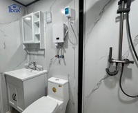 Maison préfabriquée de luxe avec revêtement gris, maisonnette déplaçable, conteneurs extensibles de 20 pieds pour jardin, ferme, appartement moderne