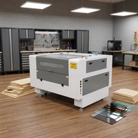 Machine de gravure laser sur tissu, découpeuse laser CO2 pour la découpe de jeans en denim et de textiles