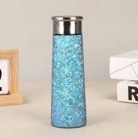 Produits tendances 2025 : Bouteille d'eau en titane, Bouteille d'eau isotherme sous vide en titane, Mini bouteille d'eau, Tasse thermos en titane pur