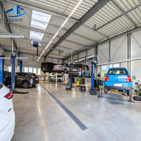 Atelier préfabriqué en acier pour la réparation automobile avec structure de toit droite et aménagement de baie de service pour véhicules