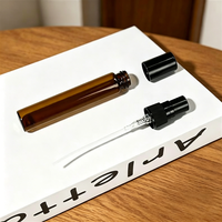 Vente en gros de mini flacons cylindriques de luxe en verre ambré pour échantillons de parfum, atomiseurs à bouchon à vis, 2ml 3ml 5ml 10ml, emballage vide pour huiles