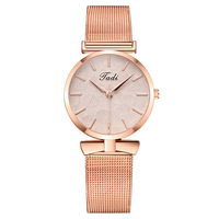 Montre à quartz pour femme avec nœud papillon, bracelet en acrylique, écologique, tendance, best-seller du commerce extérieur, vente en gros d'usine