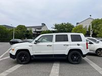 Jeep Patriot d'occasion 2013 2.4L 4x4 Édition Sport SUV Compact Noir 5 Places Personnalisation Intérieure Disponible