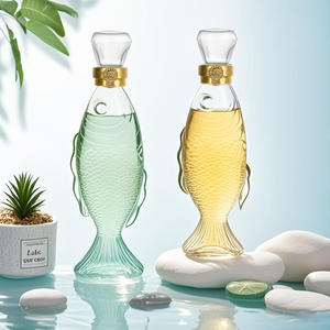 Ru Star vente en gros de haute qualité 500ml bouteille de boisson en verre en forme de poisson bouteille de jus de <span class=keywords><strong>vin</strong></span> en verre avec <span class=keywords><strong>bouchon</strong></span> en verre - Product Image 1