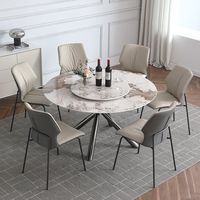 Table à manger extensible de luxe d'origine usine avec plateau en céramique transformable et pieds en métal