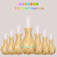 Humidificateur portable à brume fraîche et diffuseur d'arôme 160ml Mini USB Vase Design en plastique avec lumière LED pour un usage domestique
