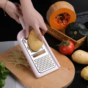 portable 2-in-1 stainless steel kitchen tool that doubles as a potato and carrot slicing