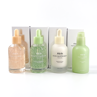 Flacon compte-gouttes en verre givré de 30 ml et 50 ml avec bouchons multicolores, flacons de sérum de luxe avec pipette, emballage cosmétique pour huiles essentielles