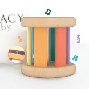 Jouets sensoriels en bois naturel en gros, hochet Montessori, <span class=keywords><strong>tambour</strong></span> à roulettes cylindrique, cloche musicale pour bébés de 6 à 12 mois, livraison directe - Product Image 1
