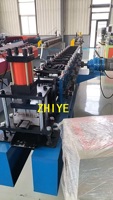 Machine de formage de rouleaux pour portes de garage à volets roulants en acier galvanisé, commande PLC, coupeur hydraulique, moteur à engrenages et roulements