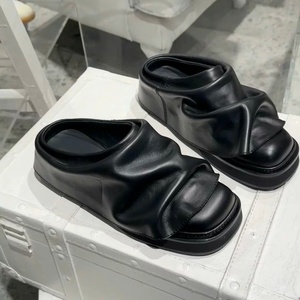 Nouveautés – Mules et sabots décontractés unisexes en cuir véritable noir à semelle épaisse pour femmes et hommes - Product Image 1