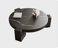 Table basse en marbre design moderne nordique pour salons à domicile, table basse ronde en marbre pour villas.