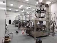 Machine d'emballage rotative LINPACK en promotion pour sachets préformés à fermeture éclair Doypack, idéale pour les capsules de lessive et les capsules de lavage des couleurs.