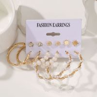 Femmes mode surdimensionné métal cercle coeur Punk boucles d'oreilles ensemble torsadé grande perle avec coquille pierre bijoux en gros