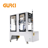 Machine d'étiquetage et de scellage automatique de cartons GURKI GPETB-40 avec ruban adhésif pour l'emballage des produits chimiques et textiles