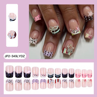 Faux ongles à porter, longueur moyenne, rectangulaires, à rayures et pois, avec étoile à cinq branches et nœud, style Y2K