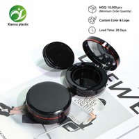 Boîte à coussin d'air ronde noire minimaliste en gros d'usine, emballage cosmétique vide personnalisable OEM/ODM