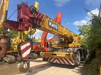Grue sur camion KATO RT d'occasion de 50 tonnes, fabrication japonaise, avec direction à 4 roues, hauteur de levage de 25 m, moteur Mitsubishi, pour travaux de construction lourds