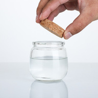 Usine personnalisée 100ML 150ML 200ML 300ML Bouteille en verre de luxe ronde avec couvercle en liège transparent pour pouding
