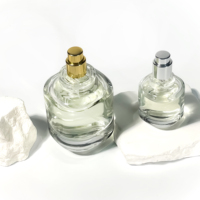 Vente en gros de nouveau design atomiseur de parfum vaporisateur bouteille de parfum emballage bouteilles d'huiles essentielles 25ml mini bouteille de parfum
