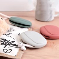 Mini étui de voyage pour écouteurs facile à transporter pochette de câble pour écouteurs en silicone