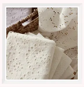 100% algodón blanco puro encaje hueco para vestido tela bordada tela de ropa de moda