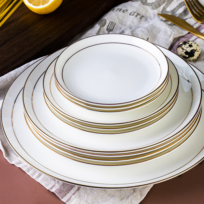 Assiette en céramique double ligne dorée