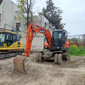 Excavatrice sur pneus hydraulique Doosan DX60W de 6 tonnes fabriquée en Corée du Sud avec moteur, pompe, roulement et moteur à vendre à Shanghai, Chine - Product Image 3