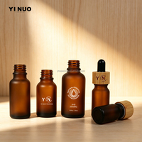 Emballage d'huile essentielle imprimé à l'écran de luxe, 5 ml/10 ml/15 ml/20 ml/30 ml/50 ml/100 ml, flacon en verre noir mat pour sérum cosmétique
