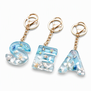 Seashell Letter <strong>Keychain</strong>, Ocean Style Initial Charm with Gold Chain, Cute Blue Shell Filled Letter for Kids, Personalized Gift - Product Image 1
