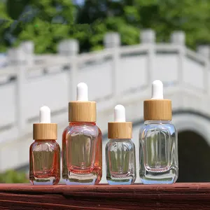 Botol tetes merah muda persik 10ml 30ml dengan cincin bambu Esens minyak esensial transparan botol kaca hidrosol kustomisasi Pr