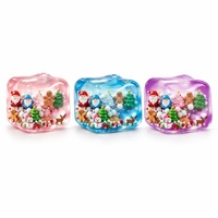 Globe à neige de Noël en cube, gel liquide à presser, bloc transparent souple, mini décoration de bureau de Noël, jouets moelleux