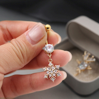Xinfocus 2026 Nouvelle conception de anneaux de nombril en forme de flocon de neige, acier inoxydable, piercing de nombril plaqué or, bijoux pour femmes et hommes
