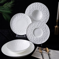Assiette de service ovale durable de 12 pouces en porcelaine de os (Bone China) en forme de fleur pour hôtels, restaurants, banquets, OEM, vente en gros