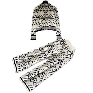 Nouvelles innovations en gros costumes pour femmes ensemble de 2 pièces col montant avec fermeture éclair chandails pour femmes rayé quotidien confortable pour femmes - Product Image 1