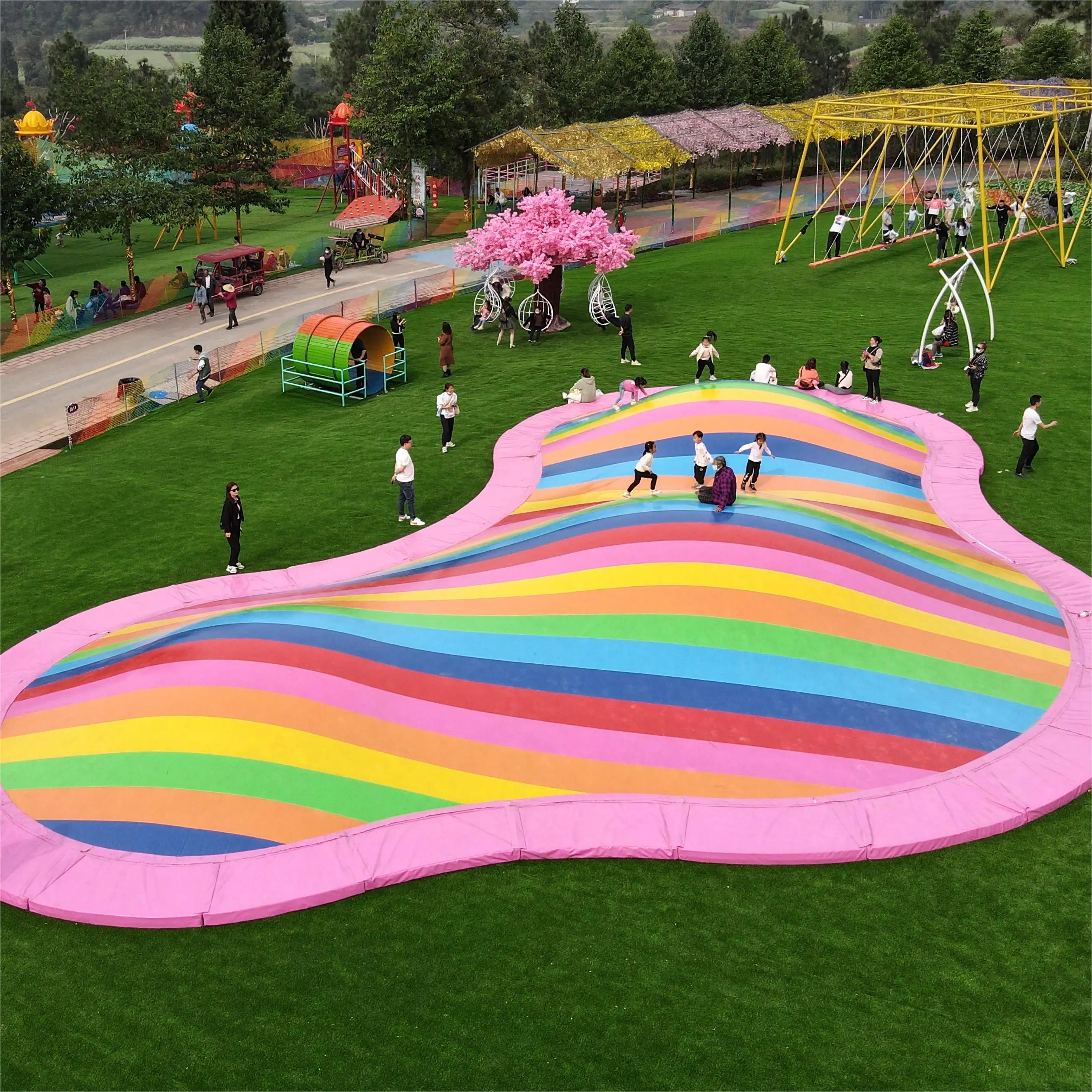 ANXIN – oreiller gonflable de saut de nuage de parc à thème gonflable de brevet d'arc-en-ciel