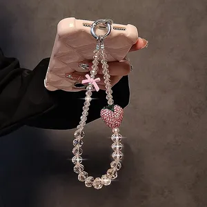 Chaîne de téléphone de luxe rose scintillante avec pendentif nœud fraise en cristal pour <span class=keywords><strong>iPhone</strong></span>, sangle de <span class=keywords><strong>bijoux</strong></span>, cadeau pour fille, décoration suspendue, cordon porte-clés - Product Image 3