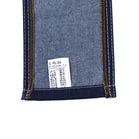 Tissu en denim 11 oz à bas prix, finition mercerisée rigide, double face lisse, pour jeans