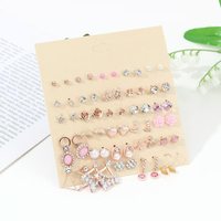 Ensemble de boucles d'oreilles tendance, design fleur, étoile de mer, papillon, en alliage, clous et pendantes, pour femmes, bijoux de luxe léger, vente en gros