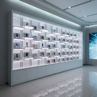 Vitrine à chaussures lumineuse orange, fabriquée à la main, avec revêtement en poudre, pour centres commerciaux, design personnalisable, pour entreprises