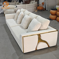 Canapé en tissu de luxe au design nordique moderne haut de gamme pour salon de villa, canapé décoratif en métal et tissu de luxe léger